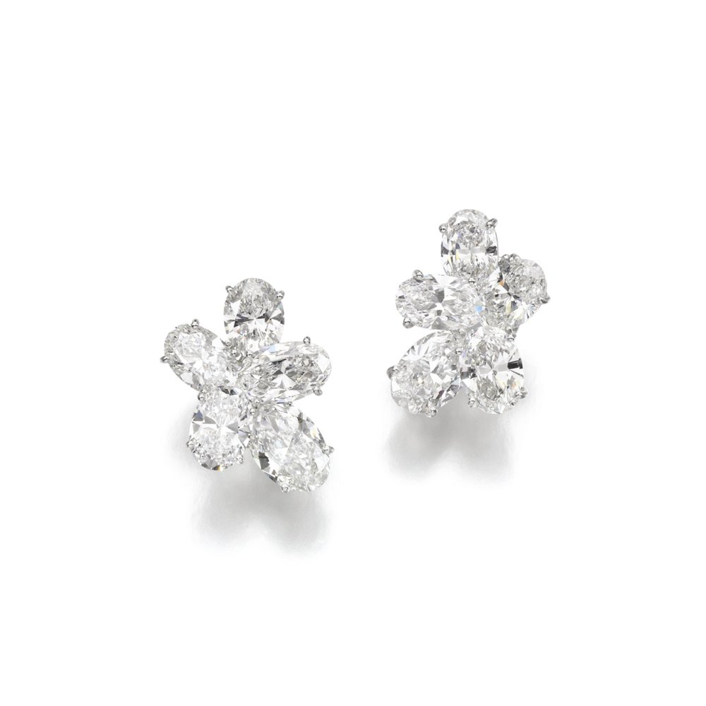  Pair of attractive diamond ear clips. Diamonds range from 2.01 to 3.08 carats.&nbsp;Accompanied by ten photocopies of GIA reports, stating that the diamonds ranging from 2.01 to 3.08 carats, are D to F Colour, Internally Flawless to VS2 Clarity. 