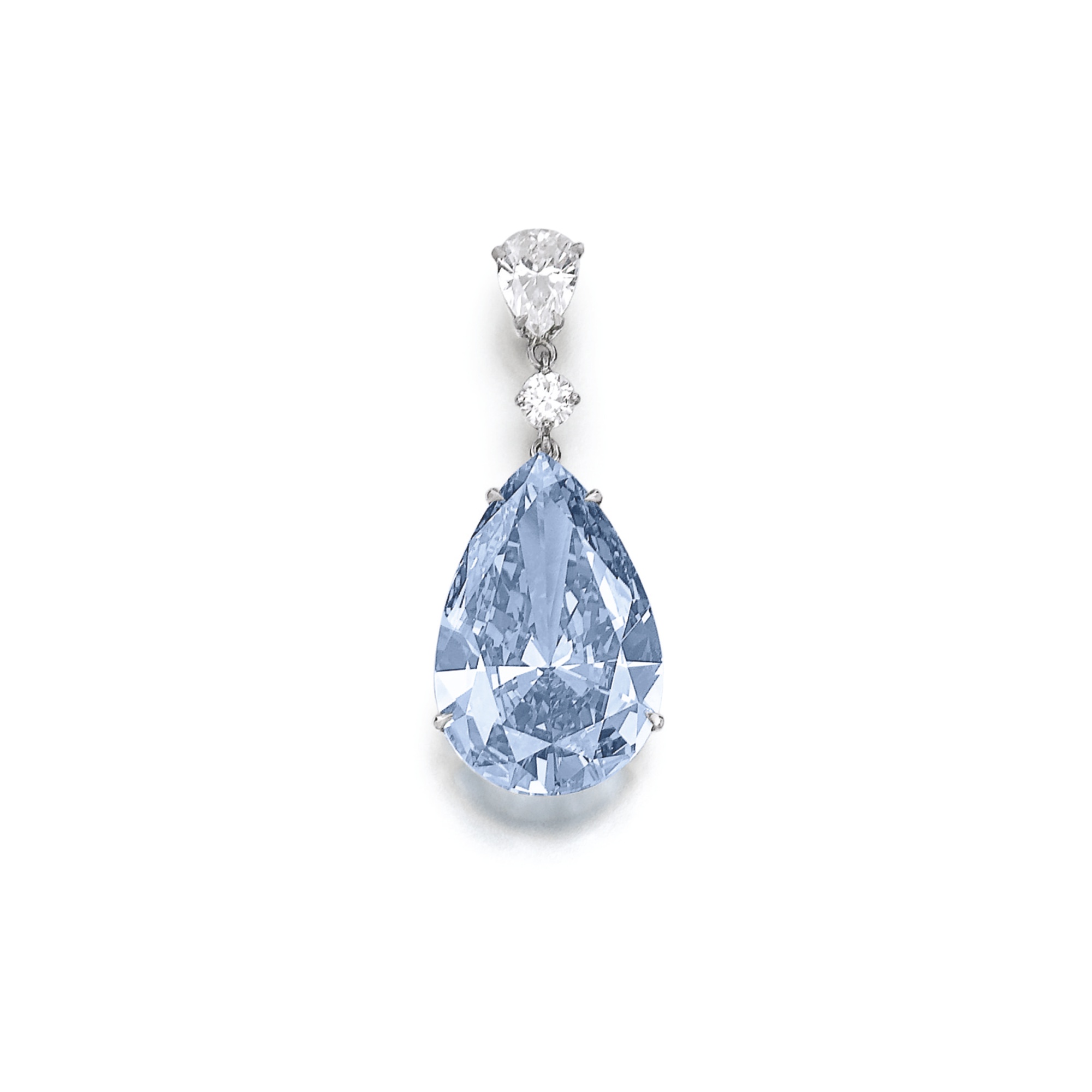  Superb and extremely rare fancy vivid blue diamond.&nbsp; The pear-shaped fancy vivid blue diamond of truly and outstanding color and purity weighing 14.54 carats, mounted as an earring with a pear-shaped and a brilliant-cut diamond, post fitting. A