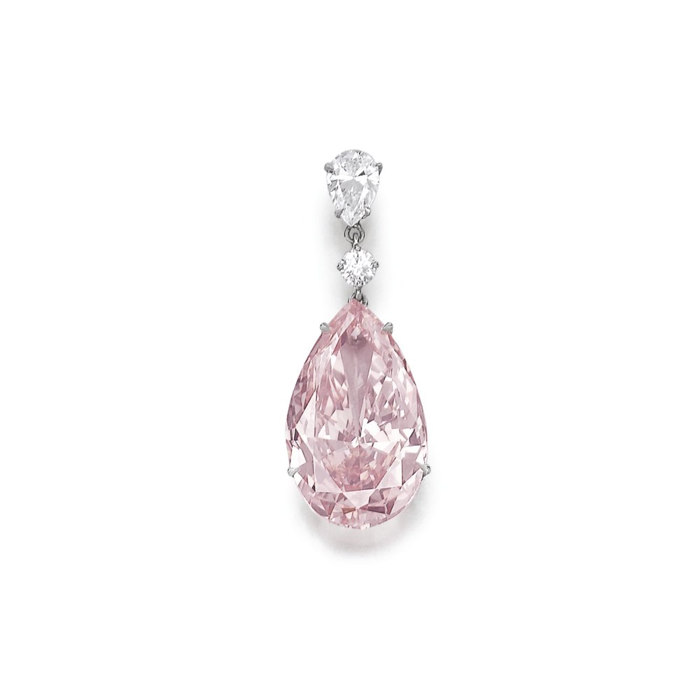 The pear-shaped fancy intense pink diamond of fine color weighing 16.00 carats, mounted as an earring with a pear-shaped and a brilliant-cut diamond, post fitting. Accompanied by a GIA certification.&nbsp; 
