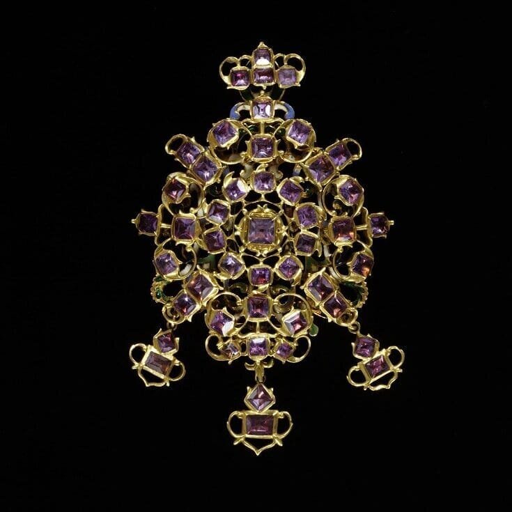 Gold pendant with amethysts and enameling on the back.  Spain circa 1625-50. Photo courtesy of the V&amp;A Museum 

One of my favorite things about the ornate jewelry from the 16th and 17th centuries is the attention paid to the entire piece. Jewelry