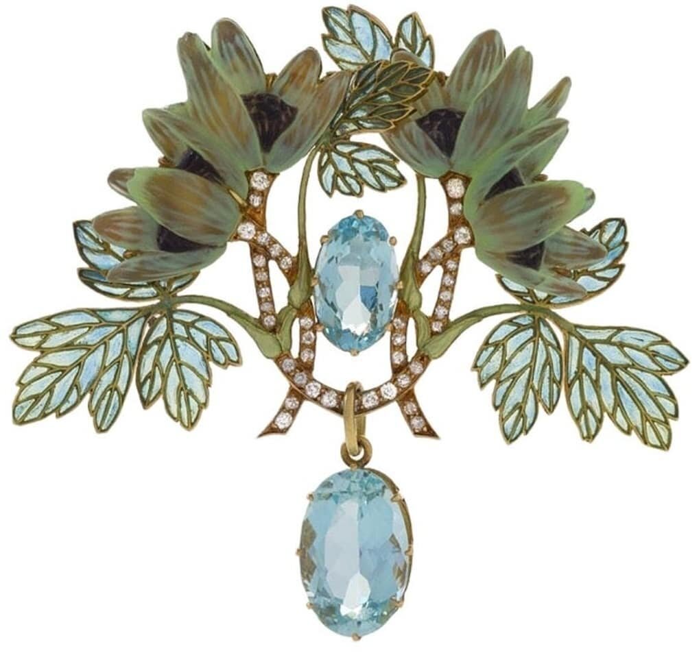 The delicate magic of art created by  Ren&eacute; Lalique is unique in the way it enchants the viewer. This brooch entitled &quot;L'An&eacute;mone de Bois&quot; is no exception. 
The romance of dappled light touching the delicate flowers of the fores