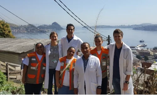 Robbie Snyder and Claire Boone with Brazilian healthcare workers working in a slum neighborhood in Niteroi