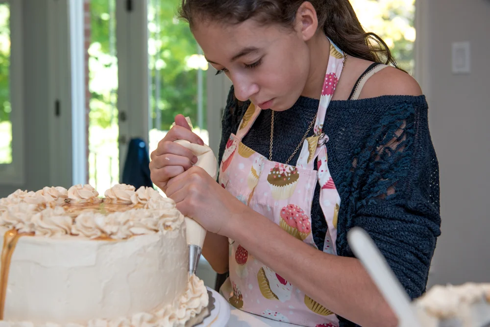 Making the final preparations before taking it to our family Thanksgiving celebration. Jaiden's cake was a huge success. Everyone loved it! Can't wait to see what she will create next...