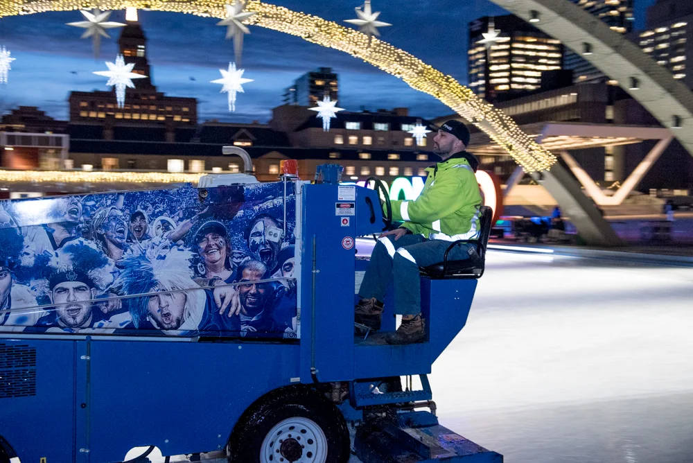 Aaaah the Zamboni driver paying close attention to his work.