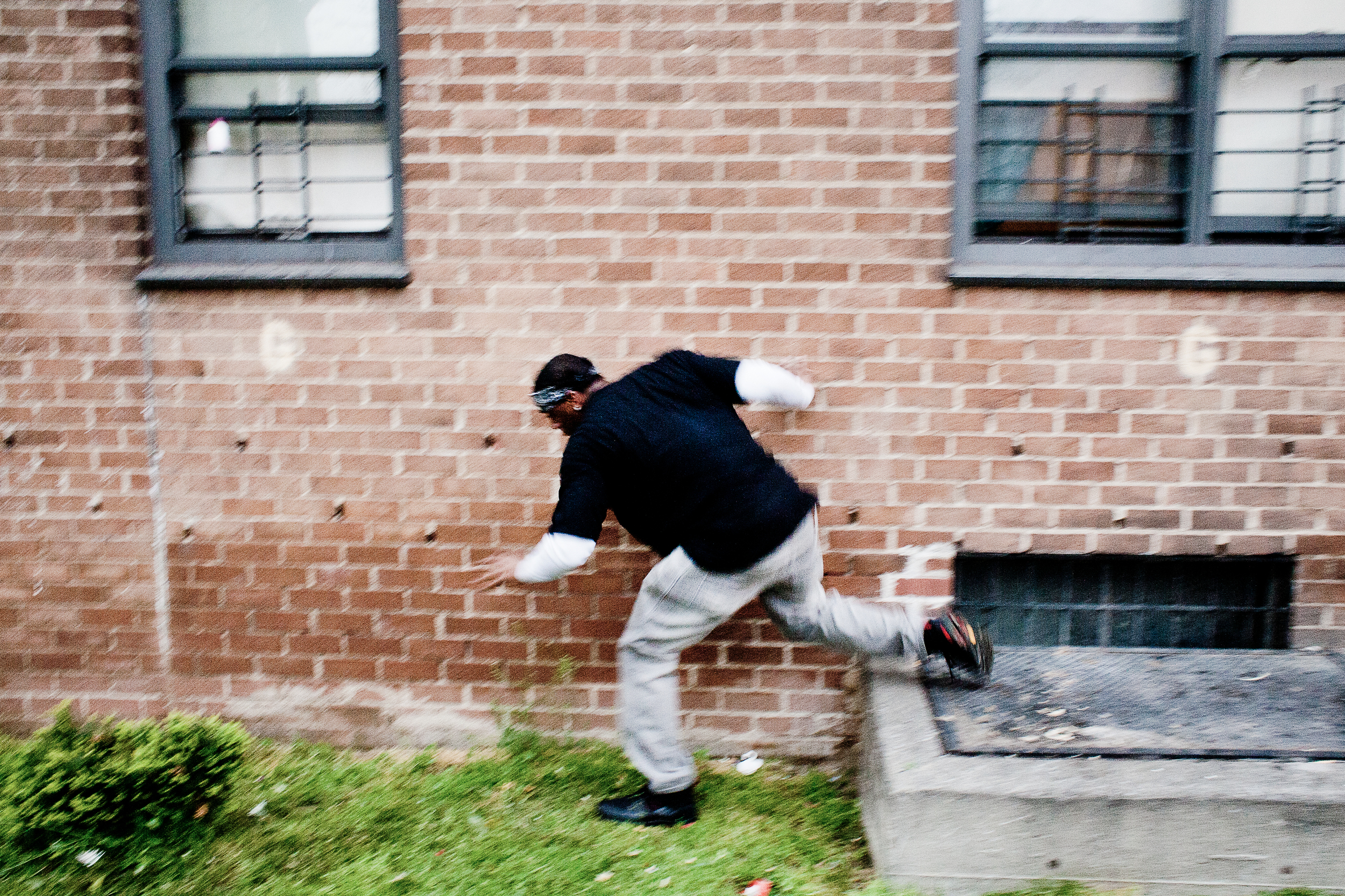 Gauge re-enacts a shooting in front of the Seth Low Houses in Brownsville, 2011.