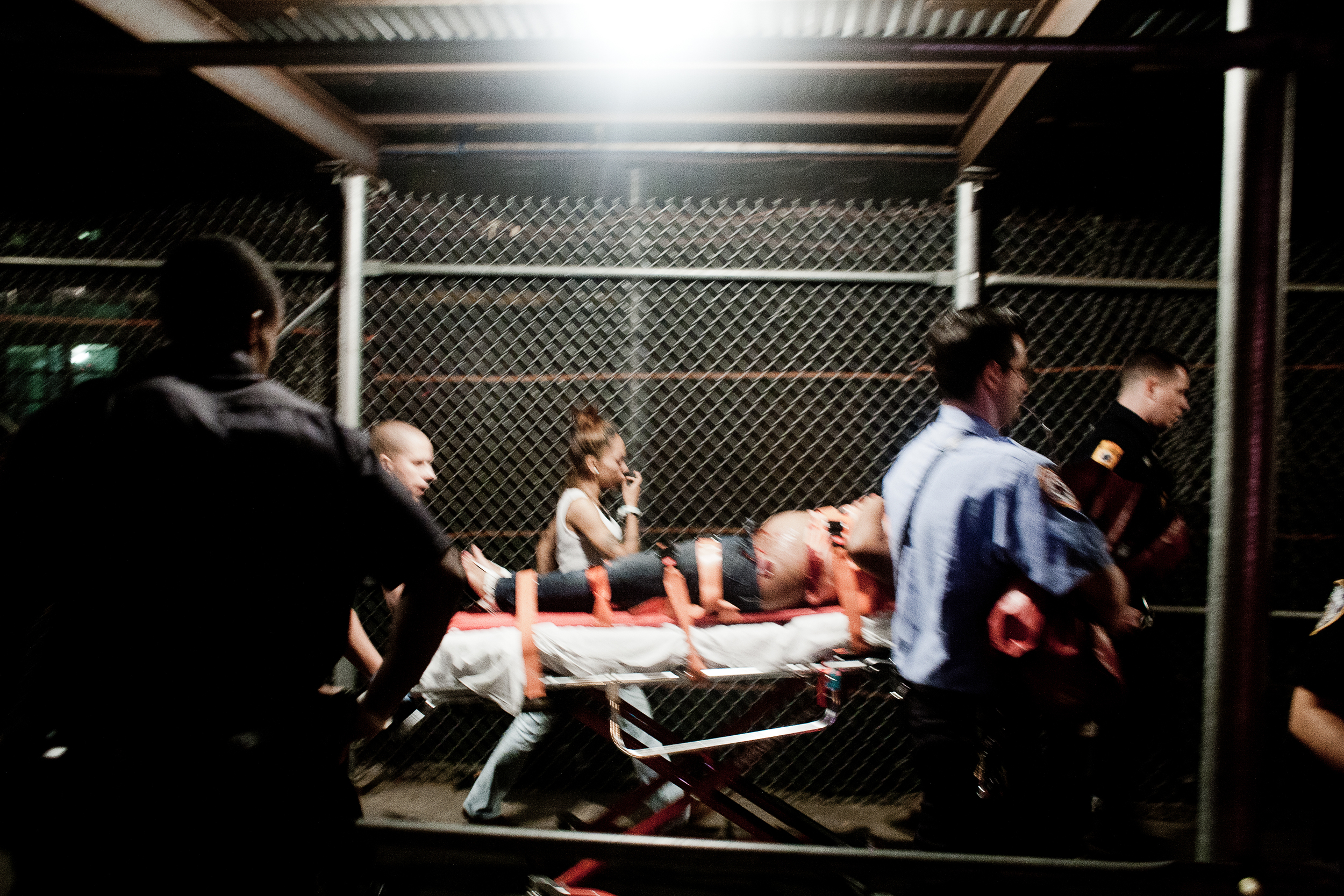 A woman is shot in in front of the Langston Hughes Houses in Brownsville, 2012.