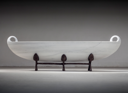 Psyche, 2015. Marble and bronze. Marble: 39 3/8 x 196 7/8 x 39 3/8 inches, bronze base: 27 1/2 x 102 3/4 x 27 ½ inches.