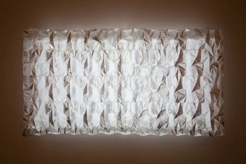 nbt.Studio, NEBBIA , 2016. Interactive wall light made from recycled electronic waste.