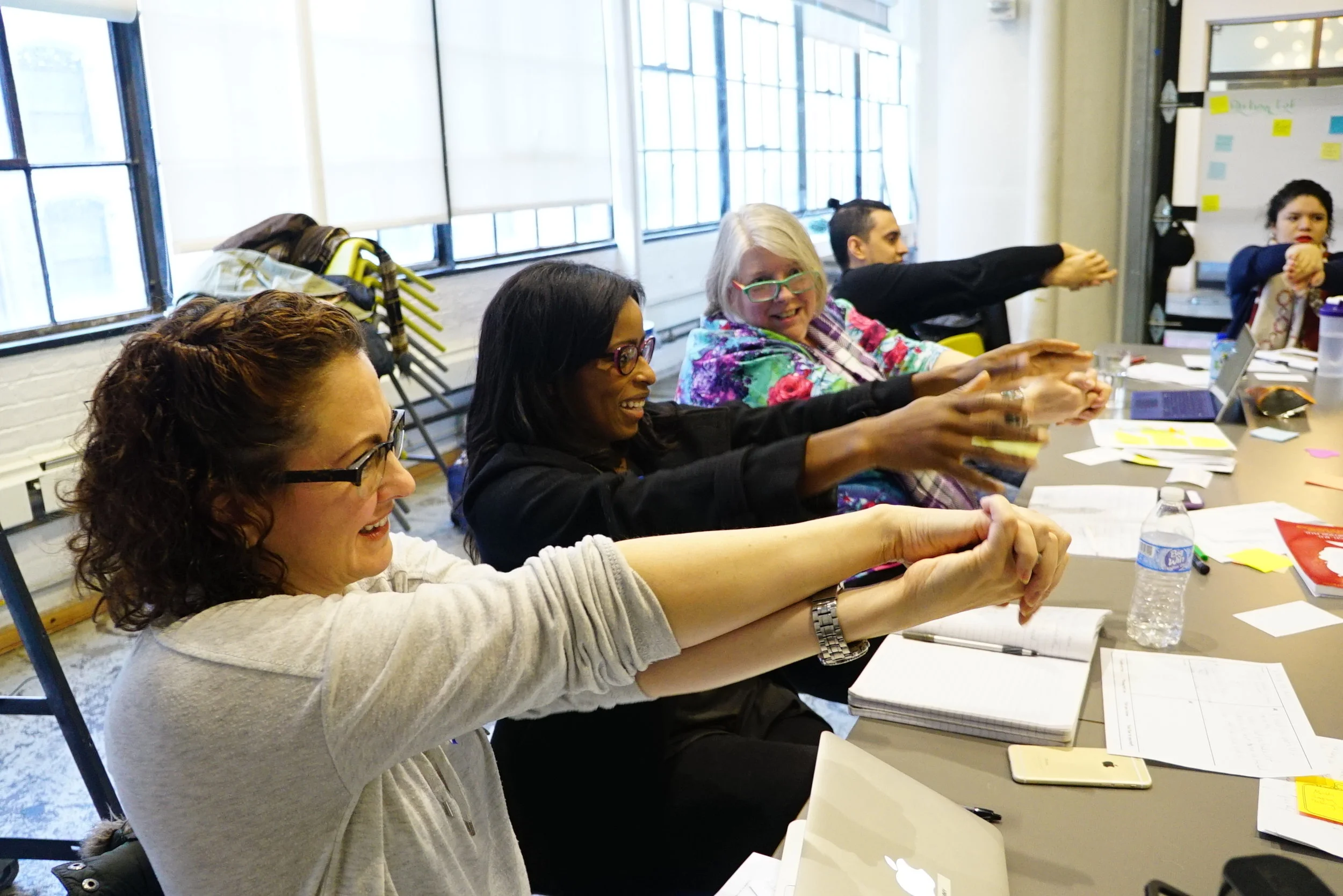 Participants smile as they repeatedly fail at this activity!