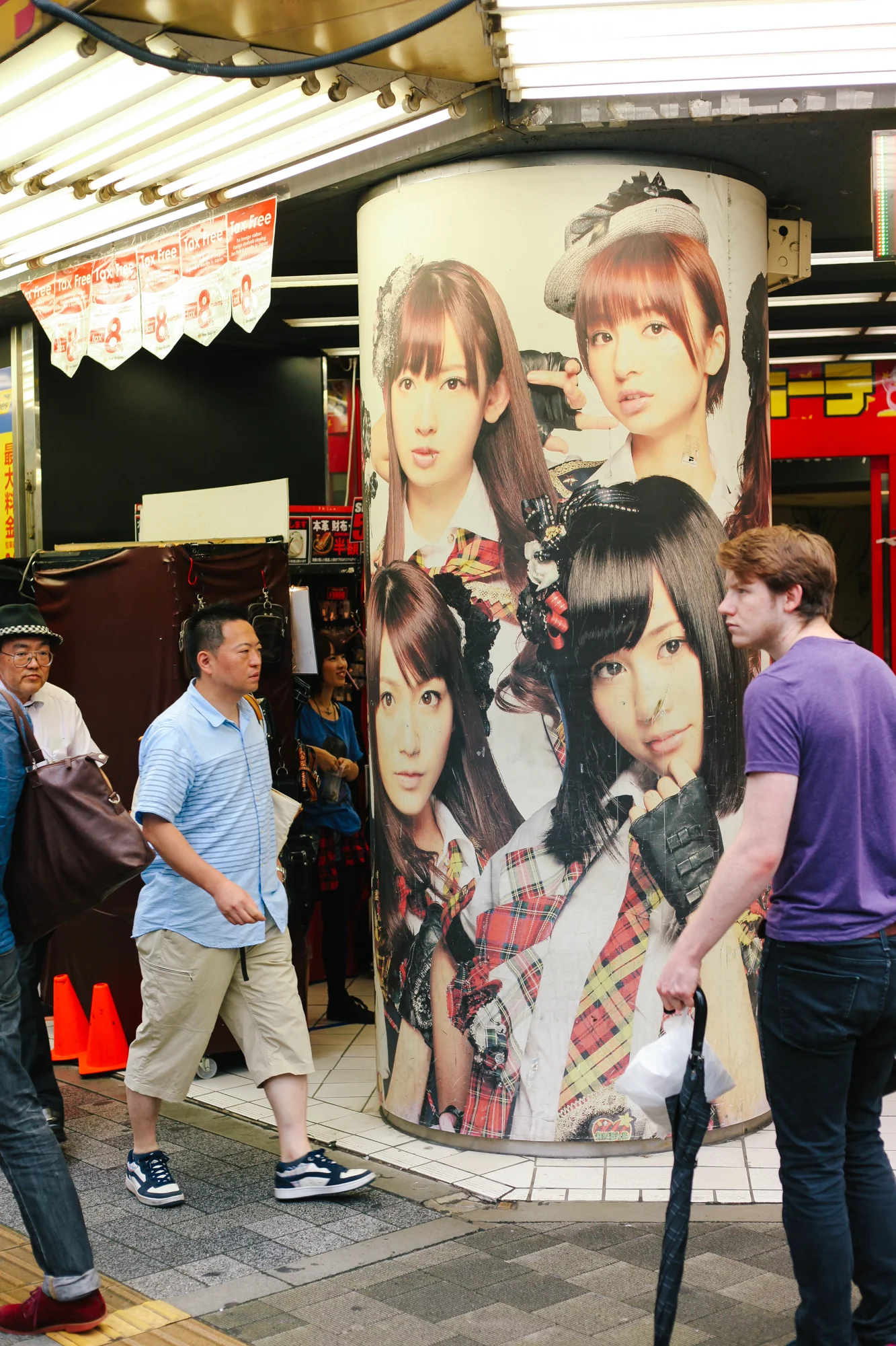 The front of what I believe was a "Maid Cafe". Girls dressed as maids stand out front coercing passers with flyers to come in. Each girl had a sign around their neck that says "NO PHOTOS". Taking photographs of the wrong thing can get you in a lot of trouble here and I'm not trying to get deported. Yet. 
