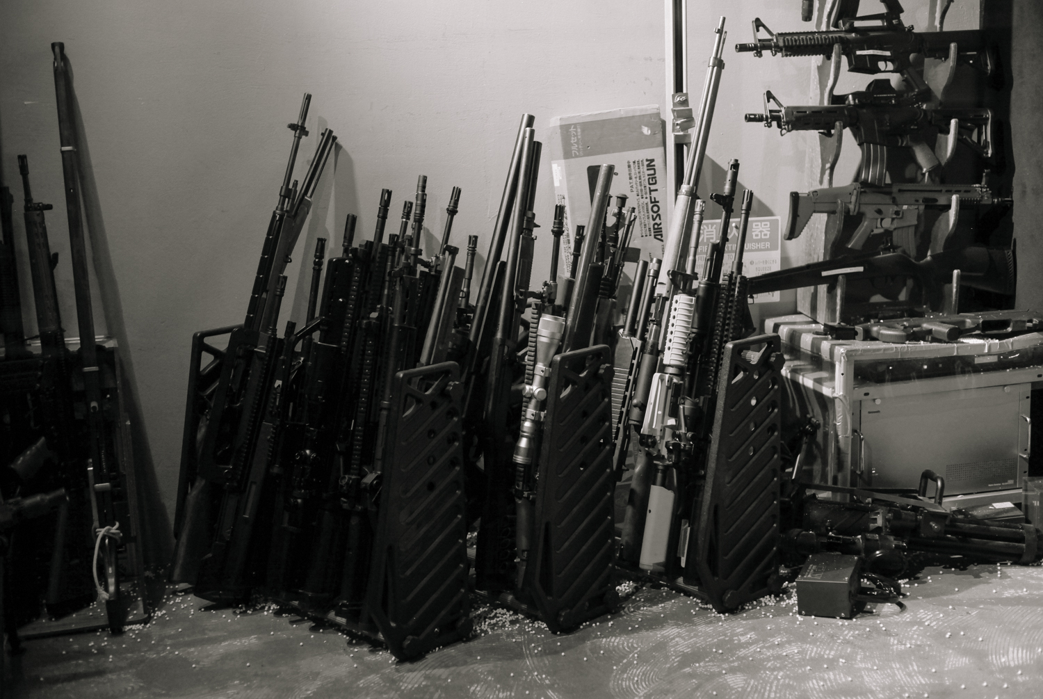 The vast arsenal of guns at the bar. 