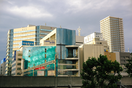 The shiny teal building was something actually really cool. From afar it was waving and looked like water. Initially, Zac and I thought it was a big LED screen, but when we walked closer we saw it was just individual pieces of shiny plastic. I've never seen anything like this before, so I thought it would be interesting to share.