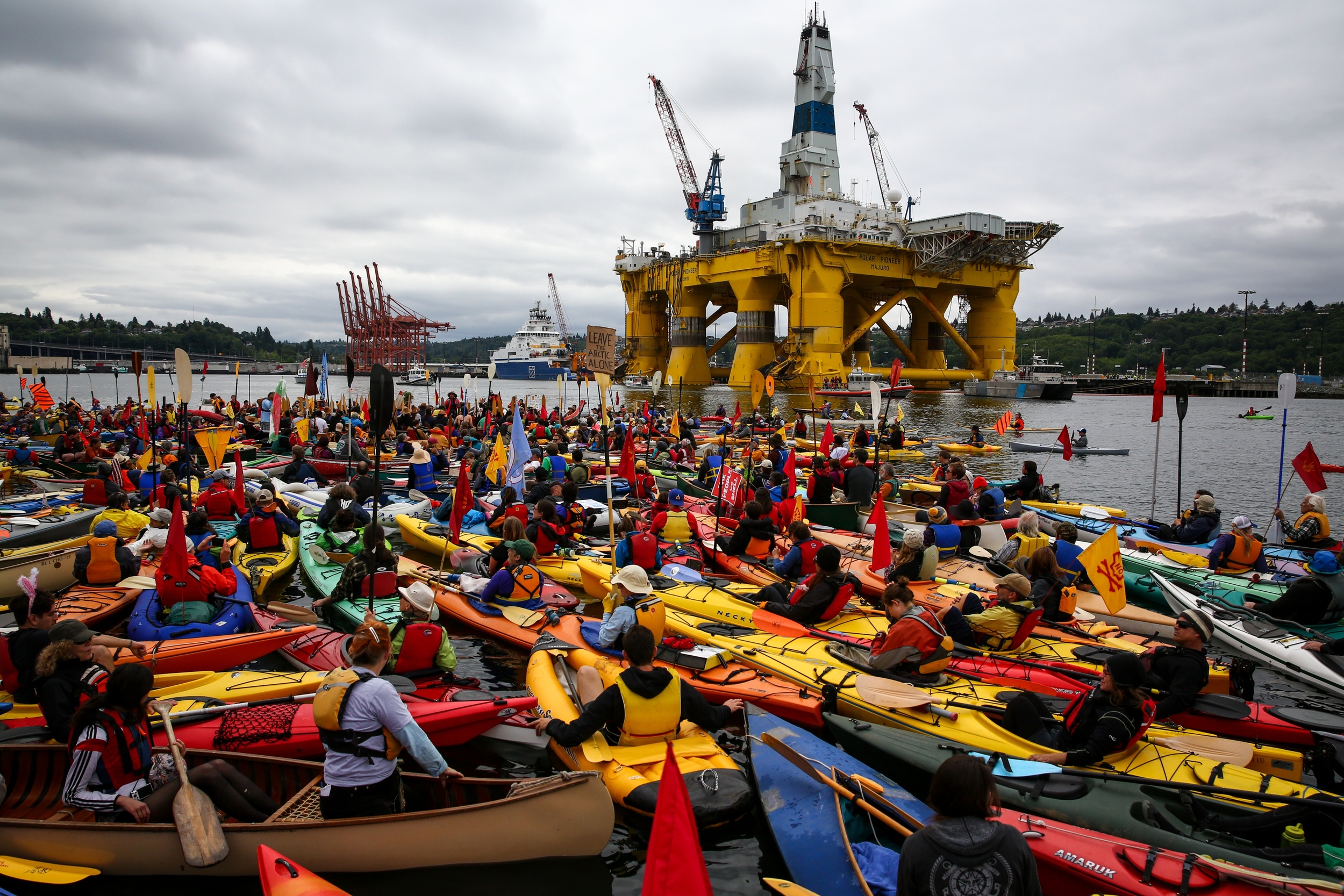   Hundreds of kayaktivists take to the water during protest against drilling in the Arctic and the Port of Seattle being used as a port for the Shell Oil drilling rig Polar Pioneer. Photographed on Saturday, May 16, 2015.  