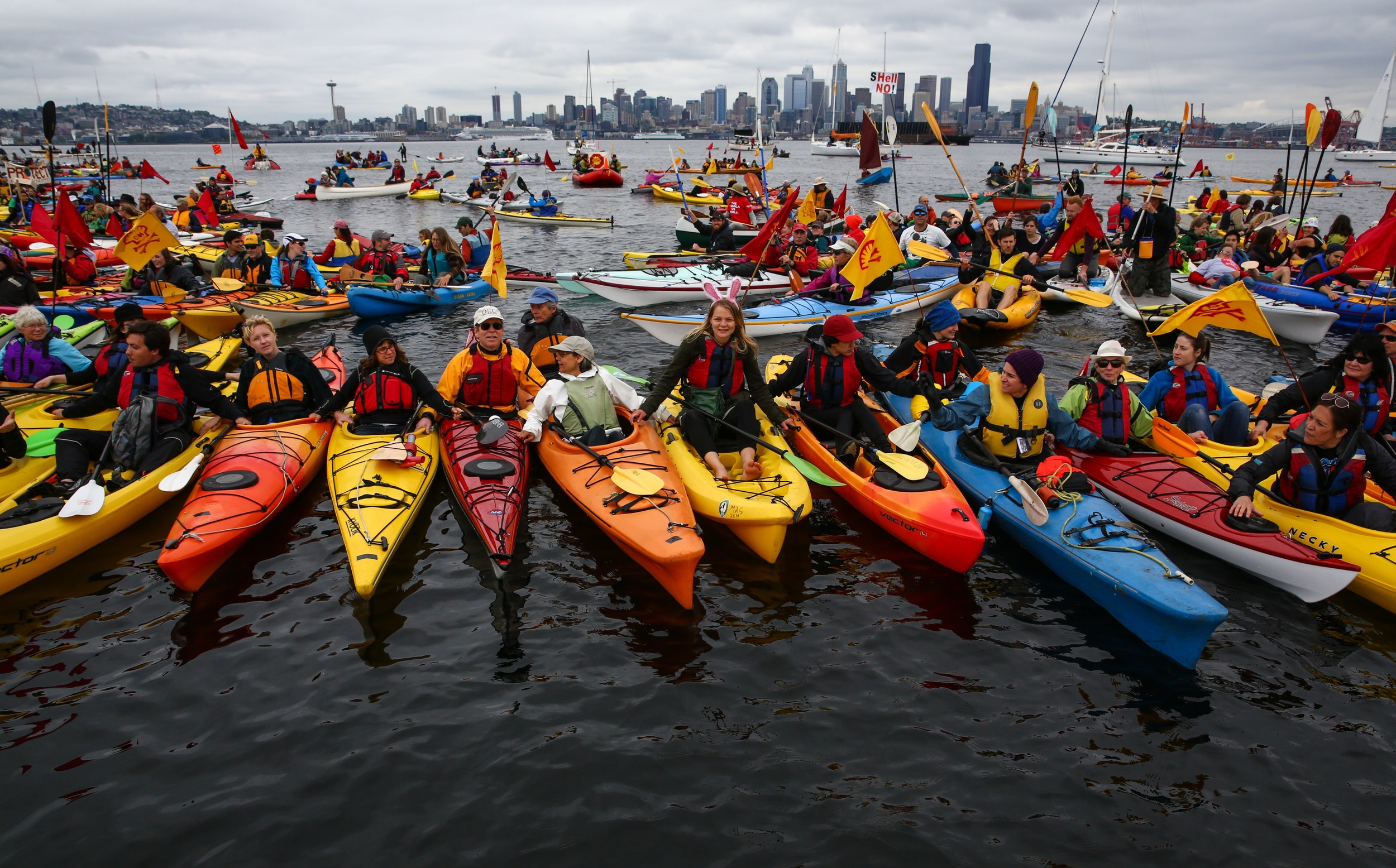   Hundreds of kayaktivists take to the water during protest against drilling in the Arctic and the Port of Seattle being used as a port for the Shell Oil drilling rig Polar Pioneer. Photographed on Saturday, May 16, 2015.  
