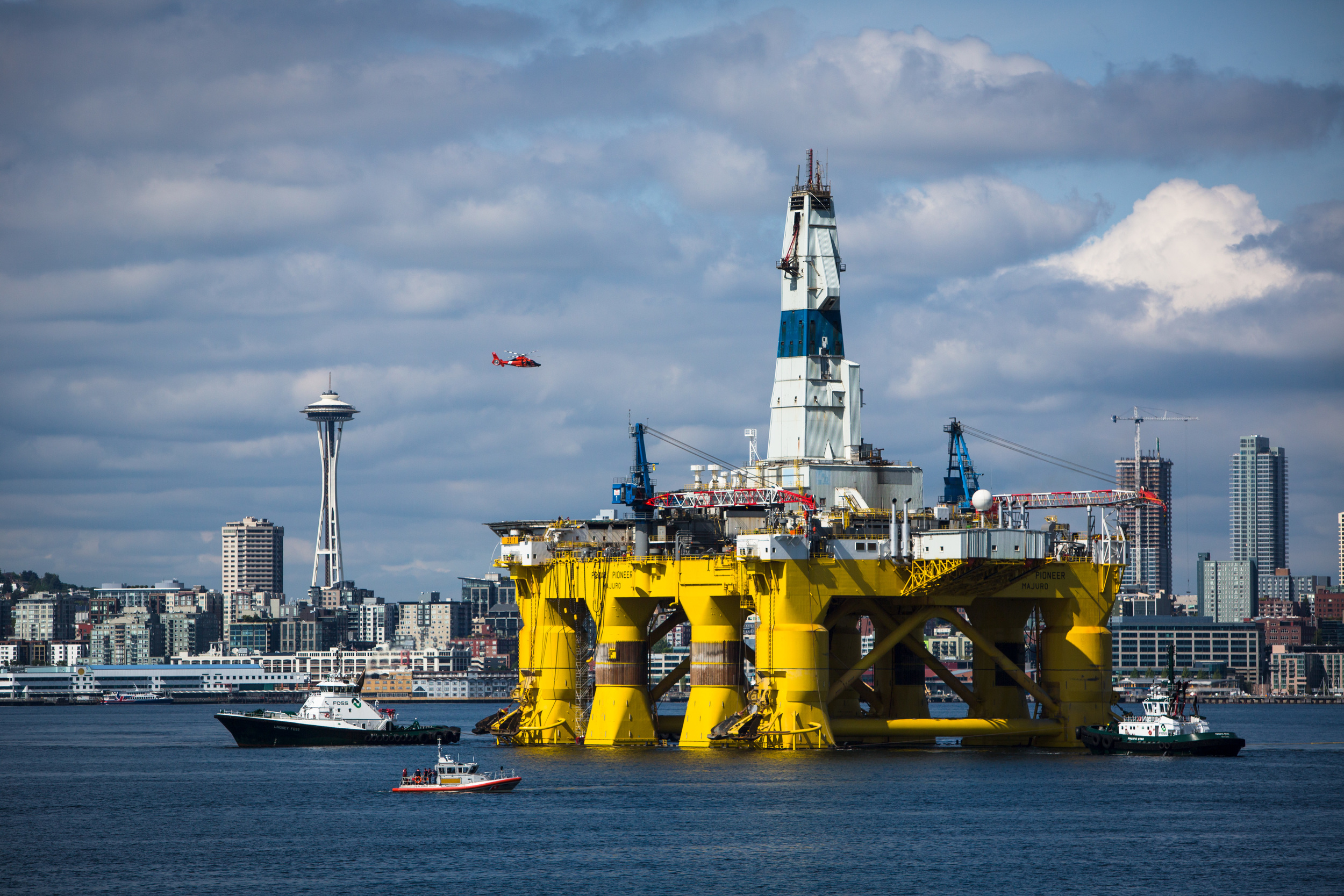   The Polar Pioneer arrives in Seattle minutes before kayaktivists took to the water to protest the potentially dangerous environmental impacts of arctic drilling.&nbsp;The protest flotilla drew many paddlers to show their displeasure with the rig be