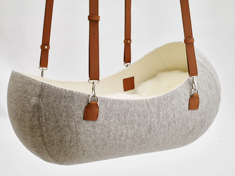 Little Nest felt cradle by O-bjekt Design. Photo via o-bjekt.com.