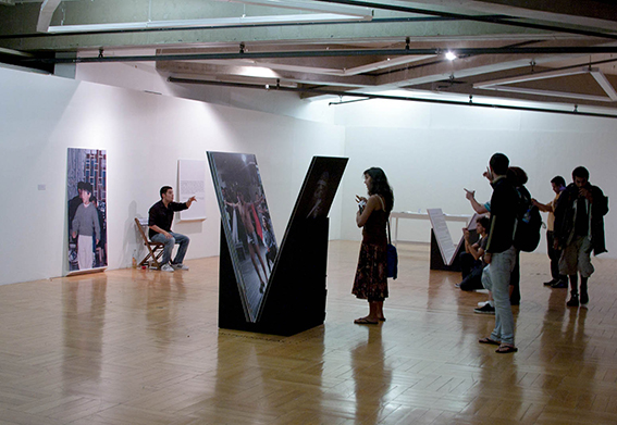 SPECTATORS INTERACTING AT THE PERFORMANCE AREA