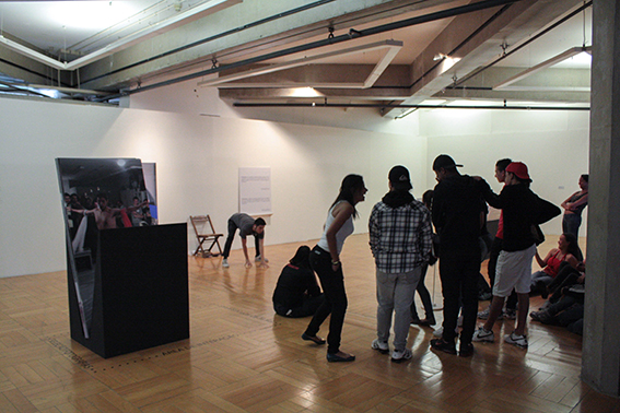 DJ TURN IT ON WHILE SPECTATORS ARE INTERACTING WITH THE PIECE