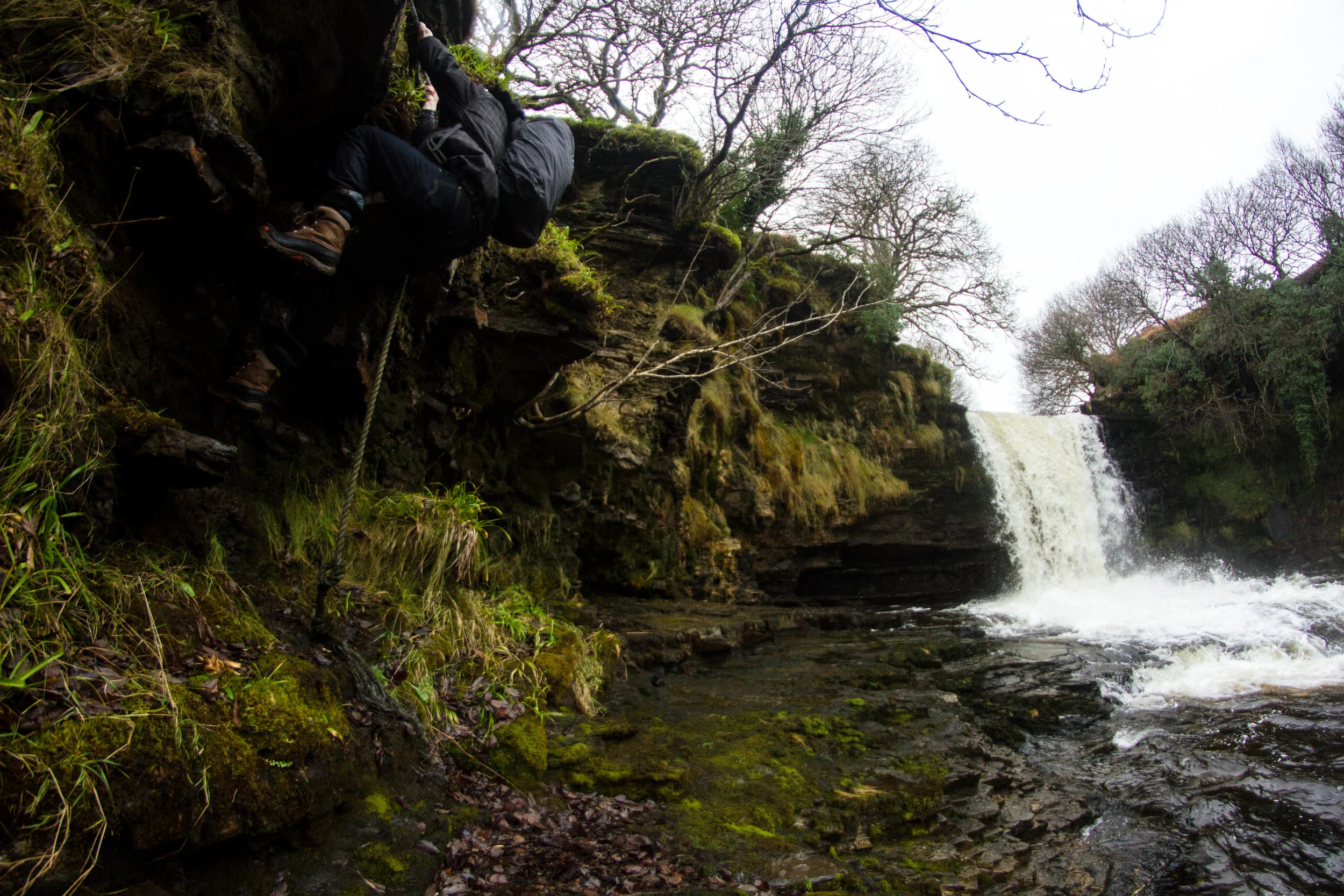 The entry and exit to the falls via rope, rock and roots