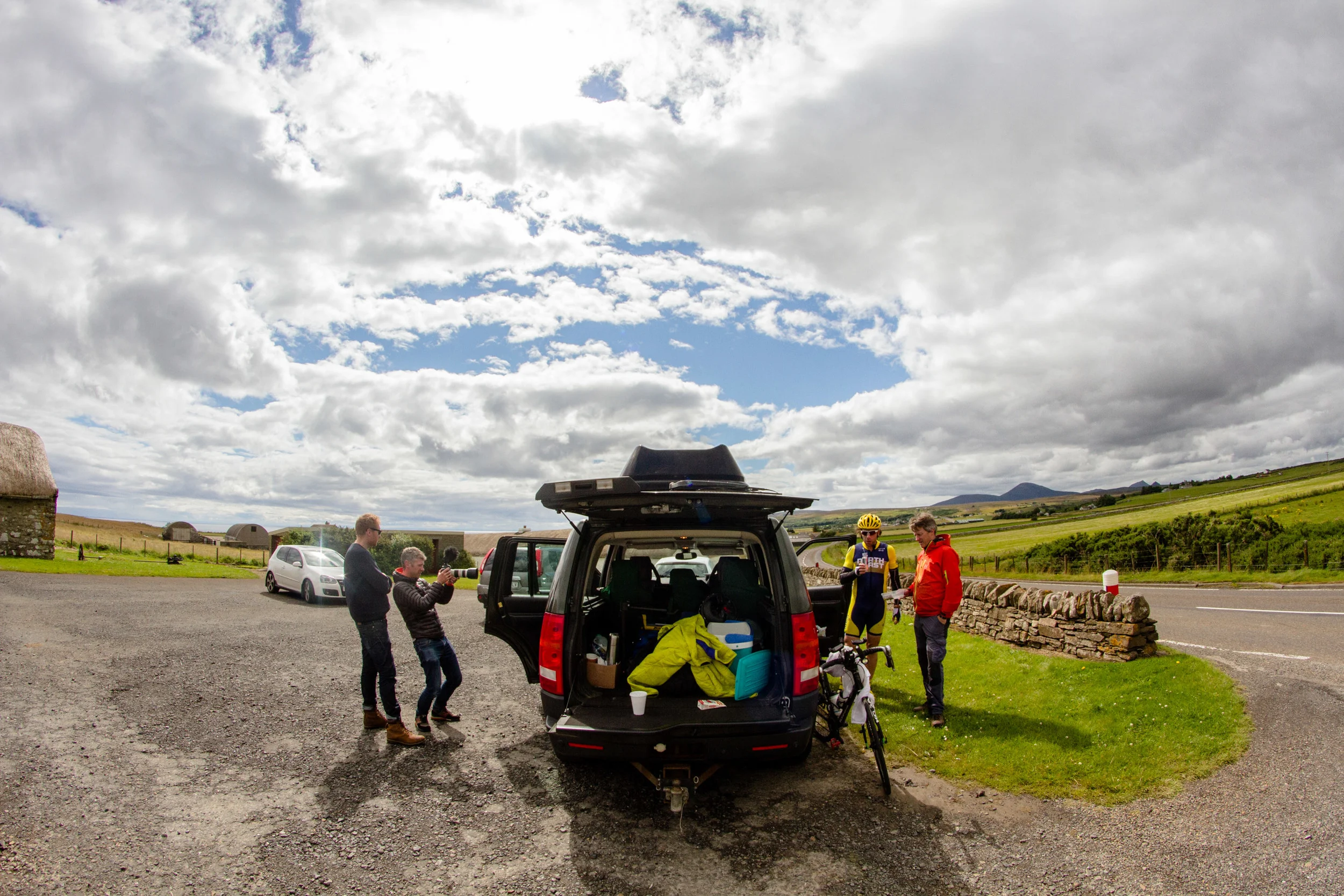 A team stop for a change before getting back on the road