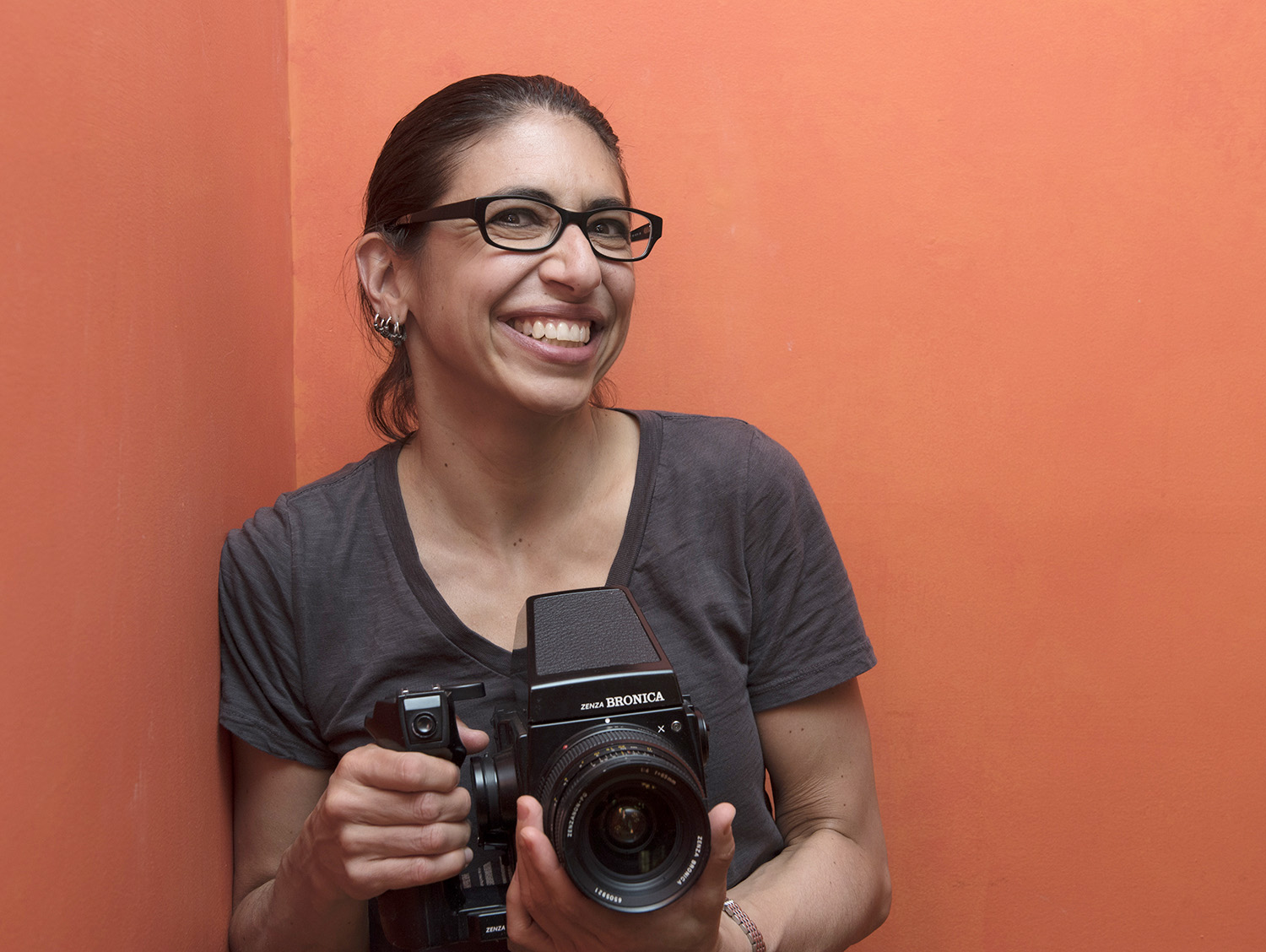 orange portrait with camera small lighter.jpg