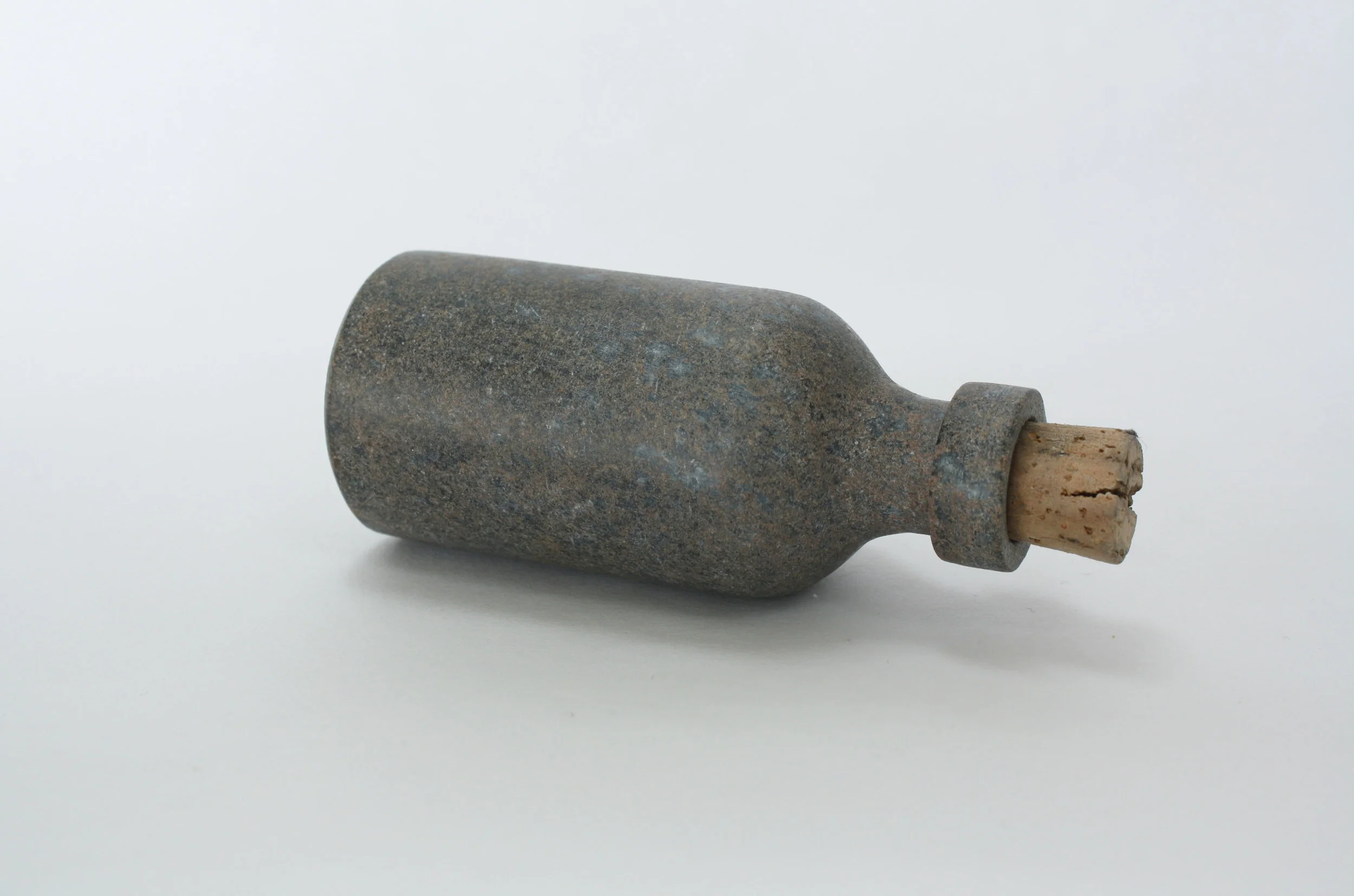 Apothecary.&nbsp; Stone and cork. &nbsp;4.25" long. &nbsp;Stone from the site of the Red Lake Ontario gold mine. 2011