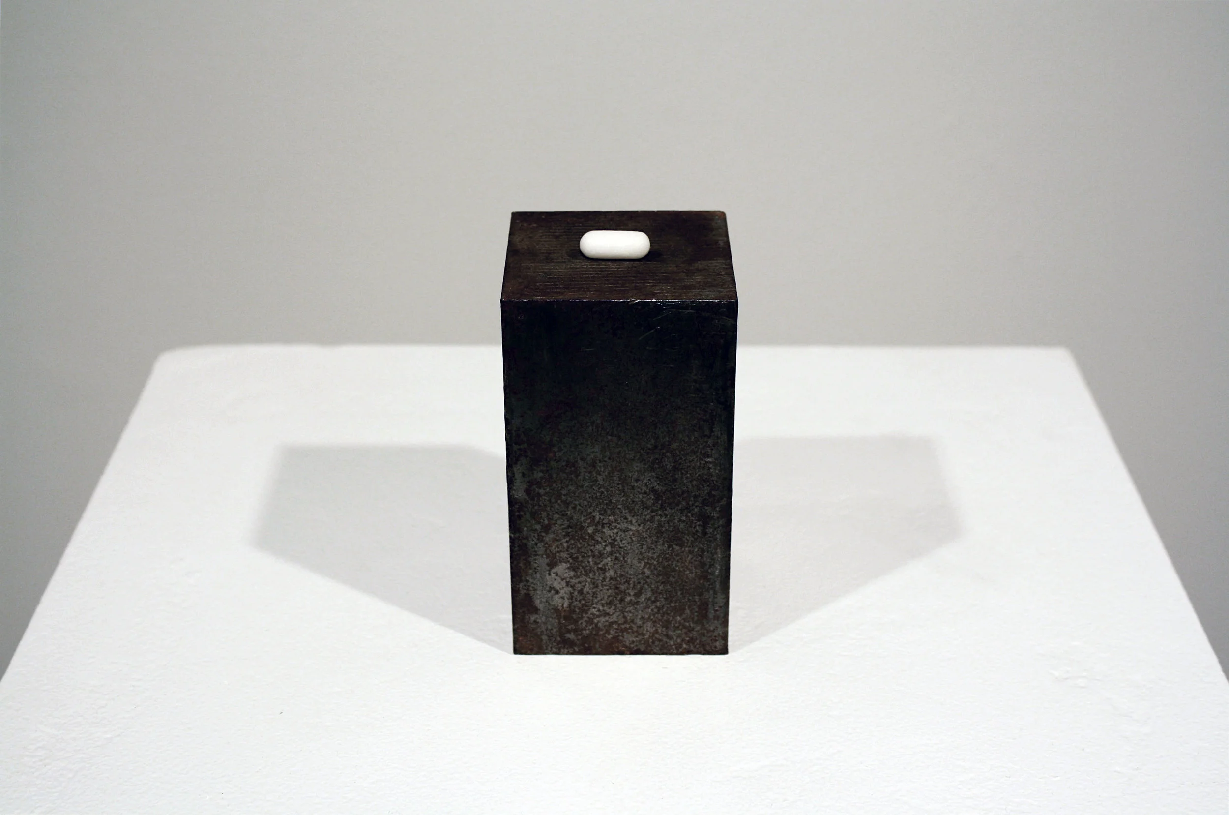 Untitled. &nbsp;Statuario marble from the quarry that produced the stone for Michangelo's Pieta, on hot rolled steel plinth. Carving: .75" long, plinth: &nbsp;2.5" x 2.5" x 4.5". &nbsp;2009