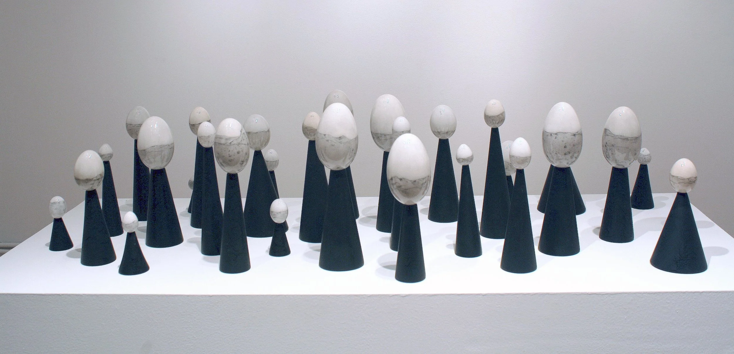 Scape Drypoint etched eggs with mixed media on painted plaster bases. 31 elements. 38" x 26" x 13". 2010. 