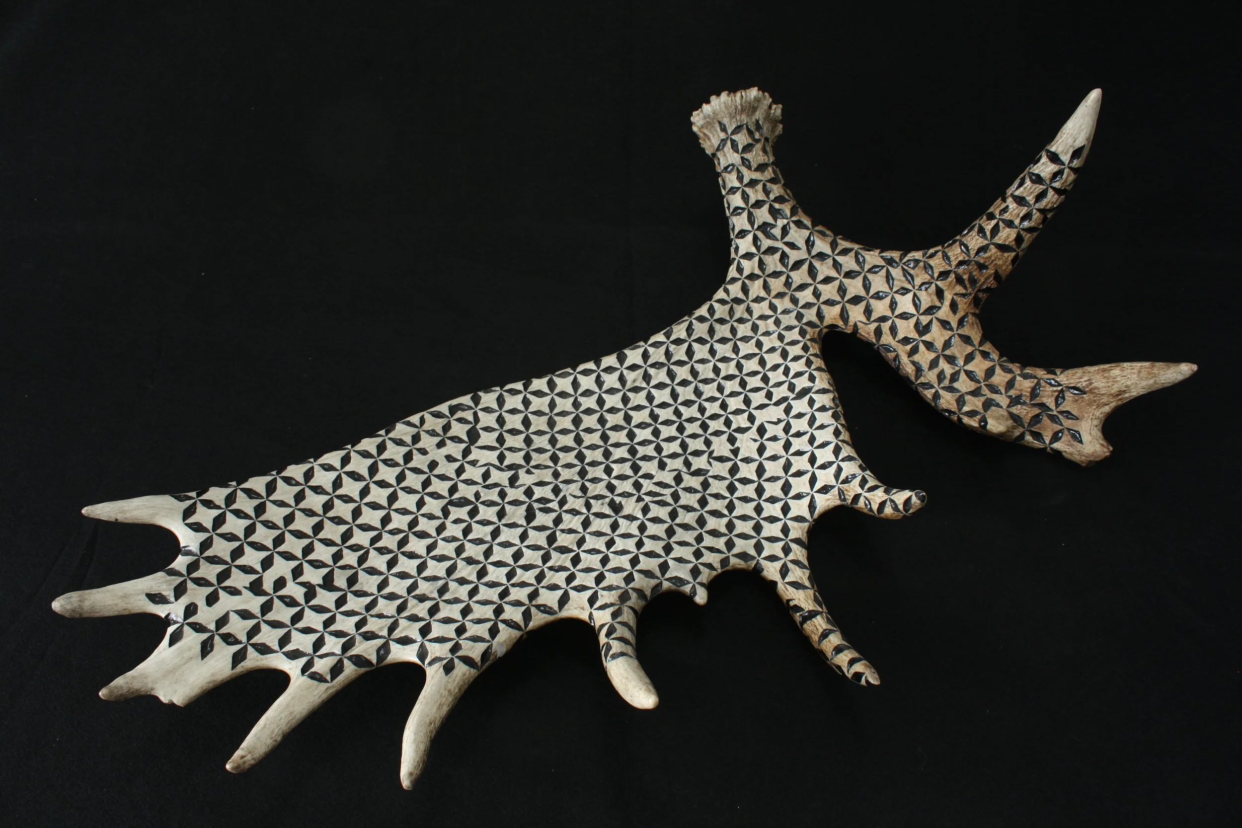 Taj&nbsp;&nbsp;Carved moosehorn and fingernail polish. 38" long. &nbsp;2008