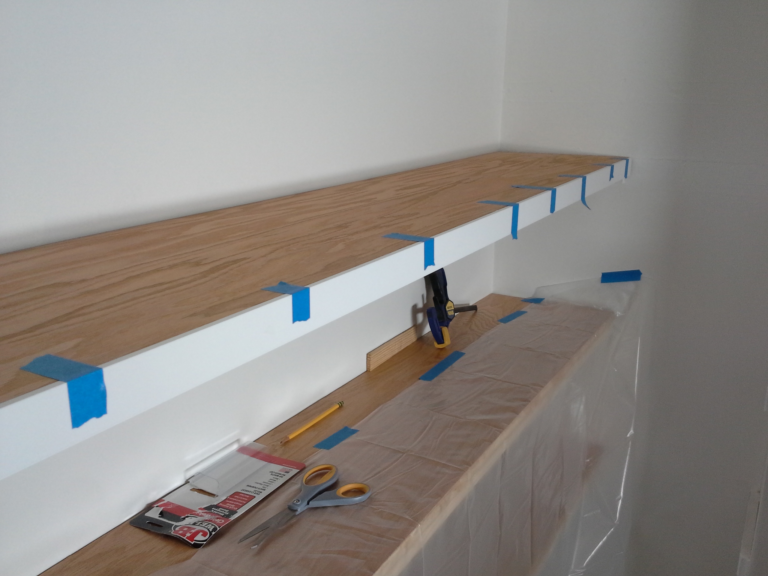 The plastic below is to catch any drips from the epoxy, but that turned out to be a non-issue.