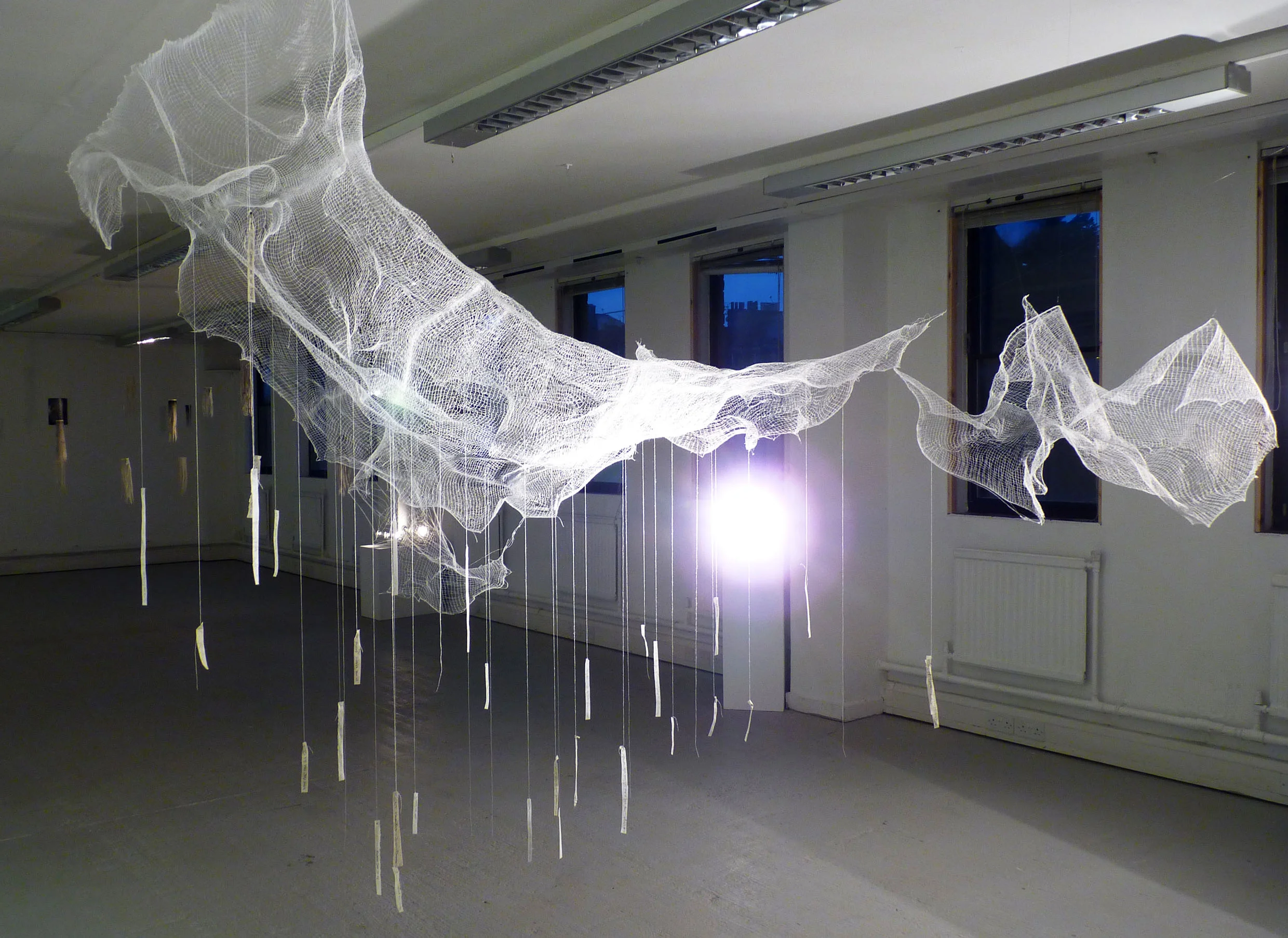 Thought Cloud - knitted textile, thread, paper (with written personal statements and anonymous statements contributed by visitors). 2015