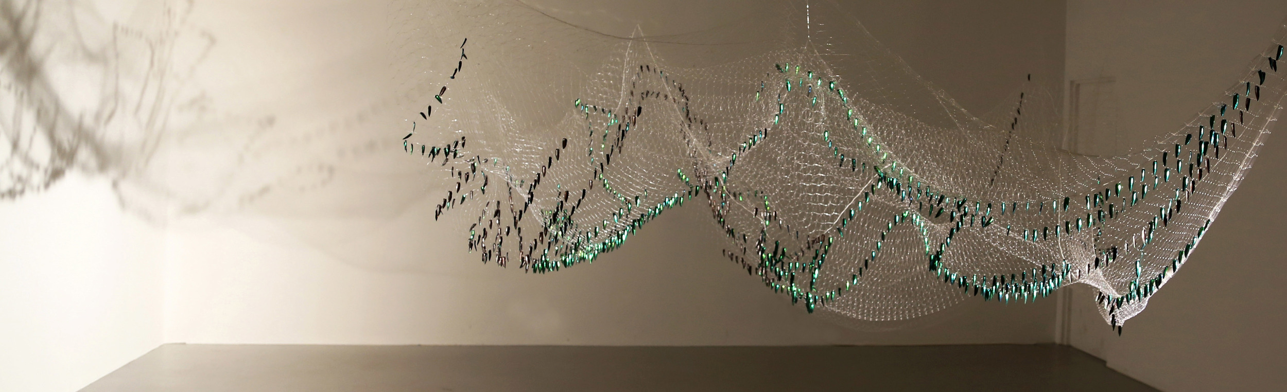   Shoal Installation -&nbsp;  Thai fishing net, Sternocera Aequistignata beetle wings. 2015  