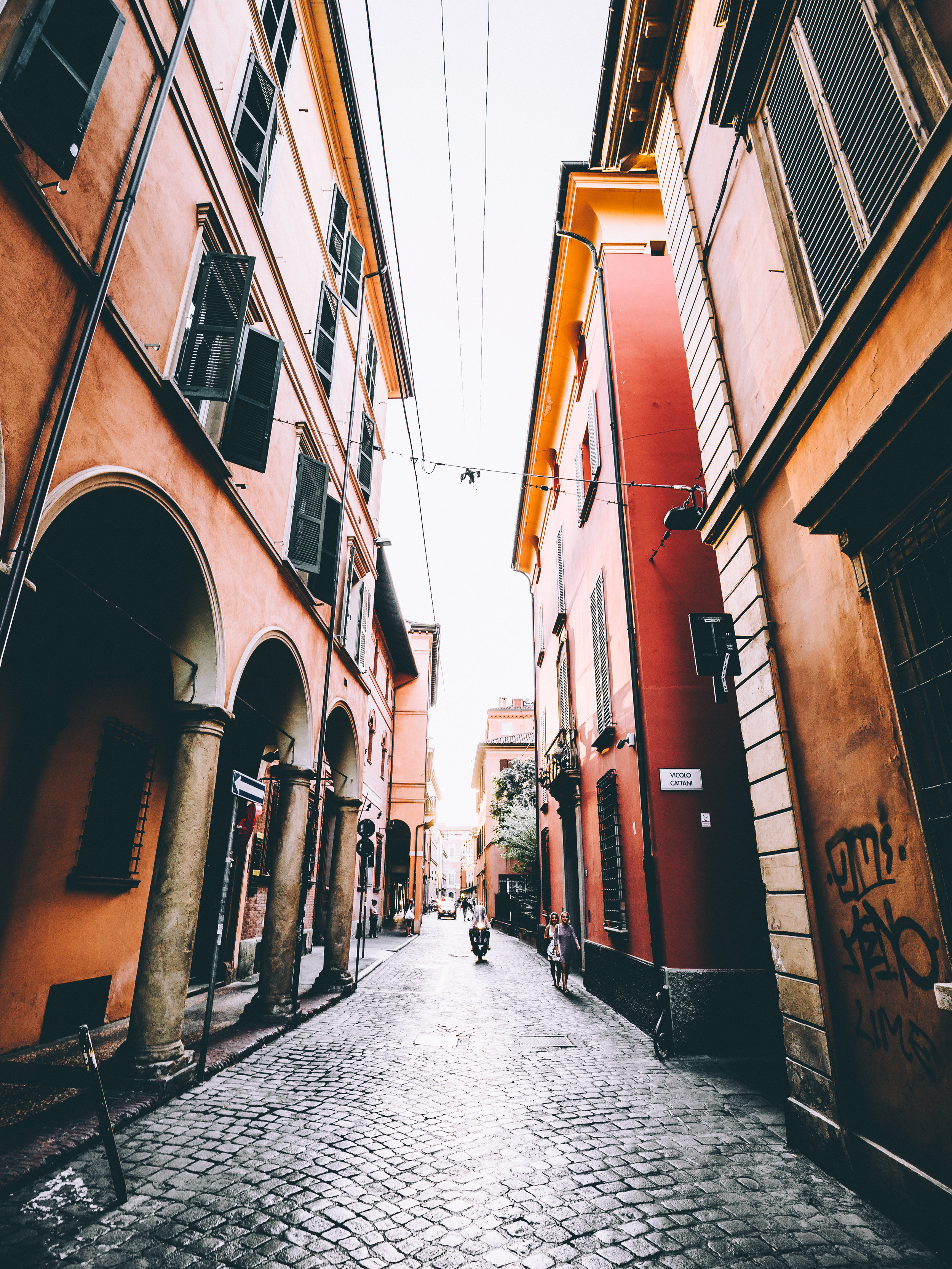 The setting sun adding warm color to the beautiful architecture in the narrow streets.