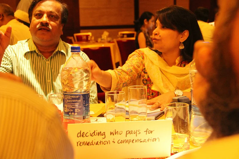 Discussion on who pays for factory remediation and compensation for workers