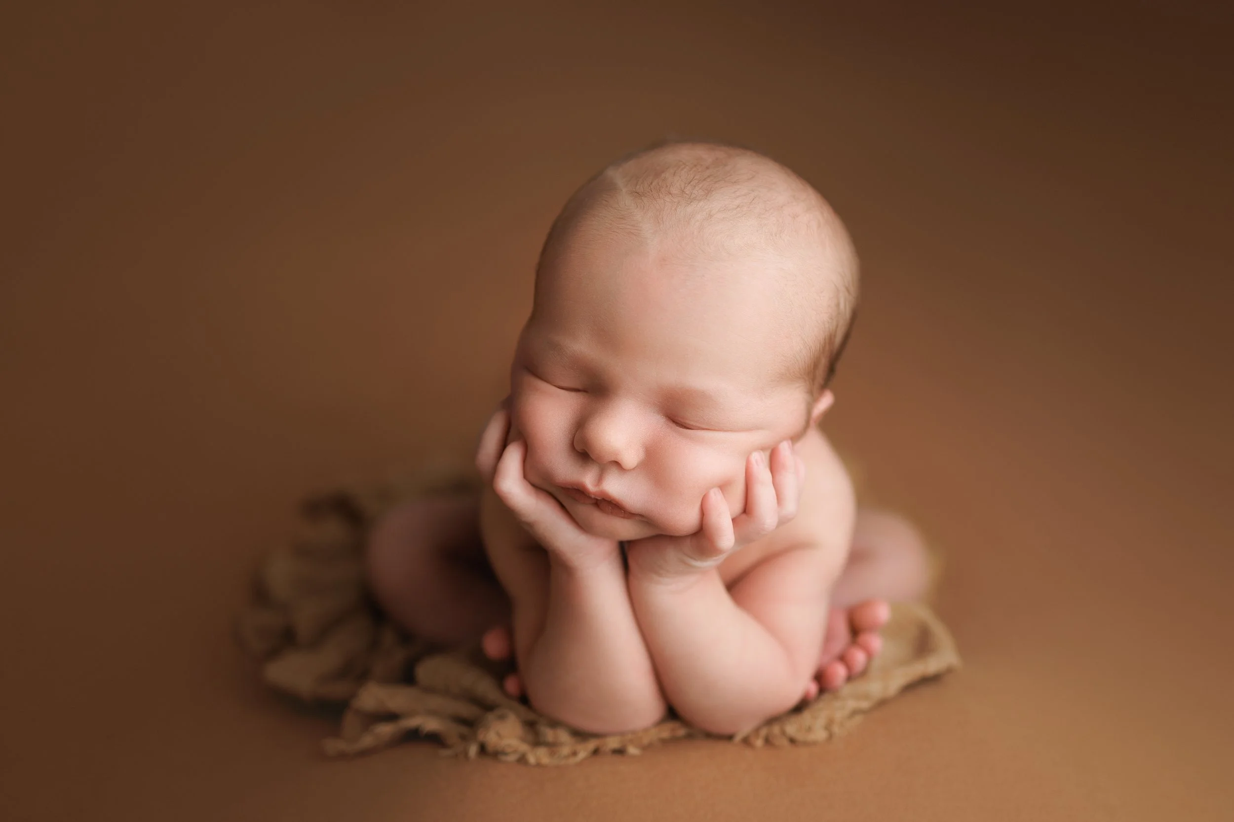newborn frog pose