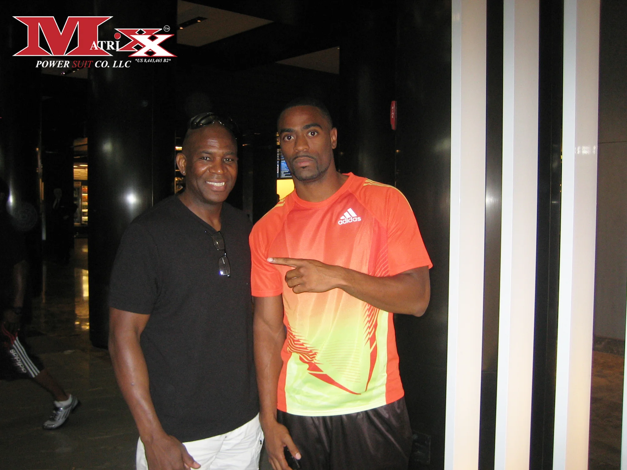 Calvin w Olympic Runner Tyson Gay 2012