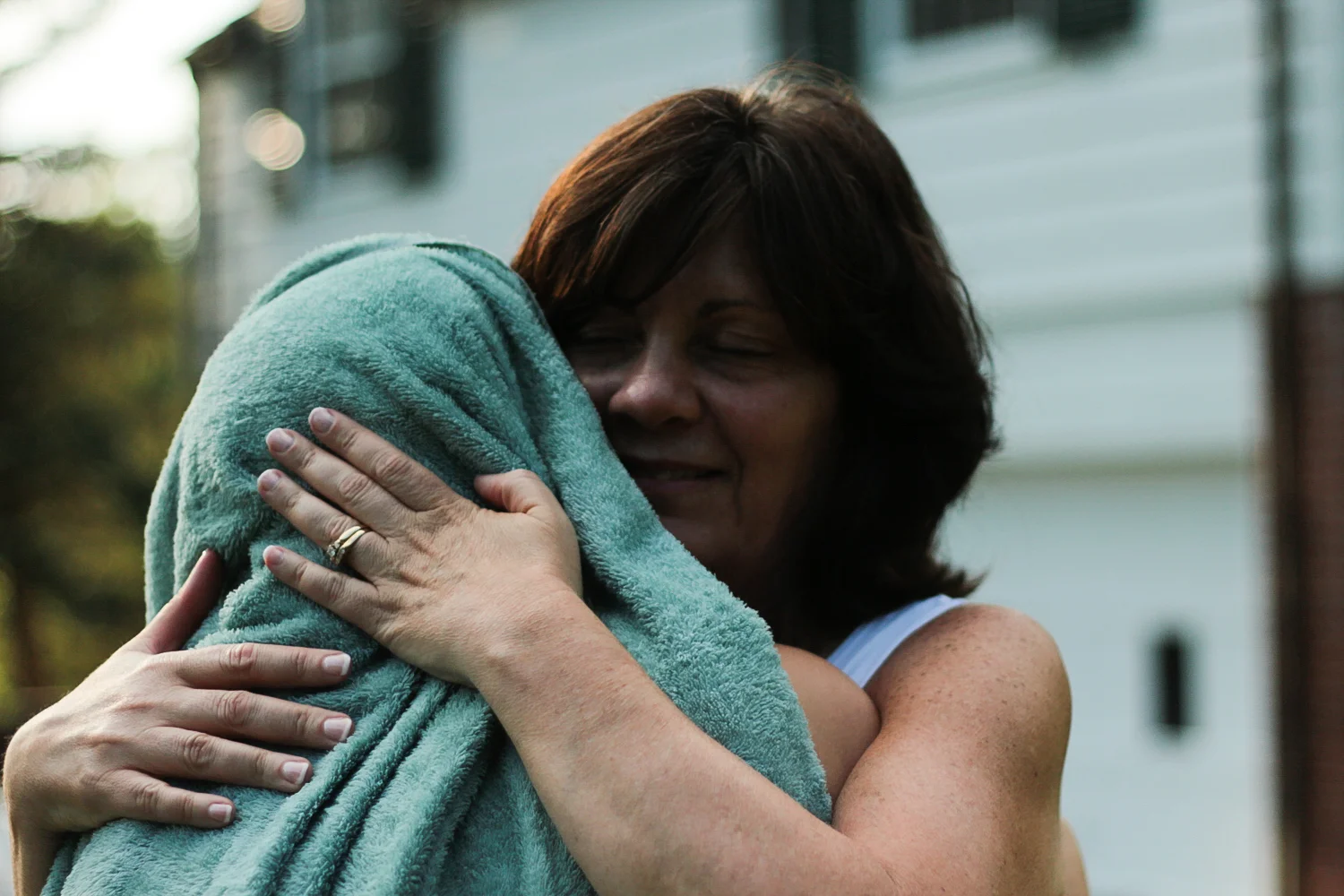 Ann and Kat hugging after baptism.jpg