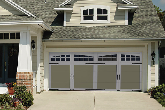 This garage door reflects the craftsman style of the home. Look closely, it is one door made to look like two.