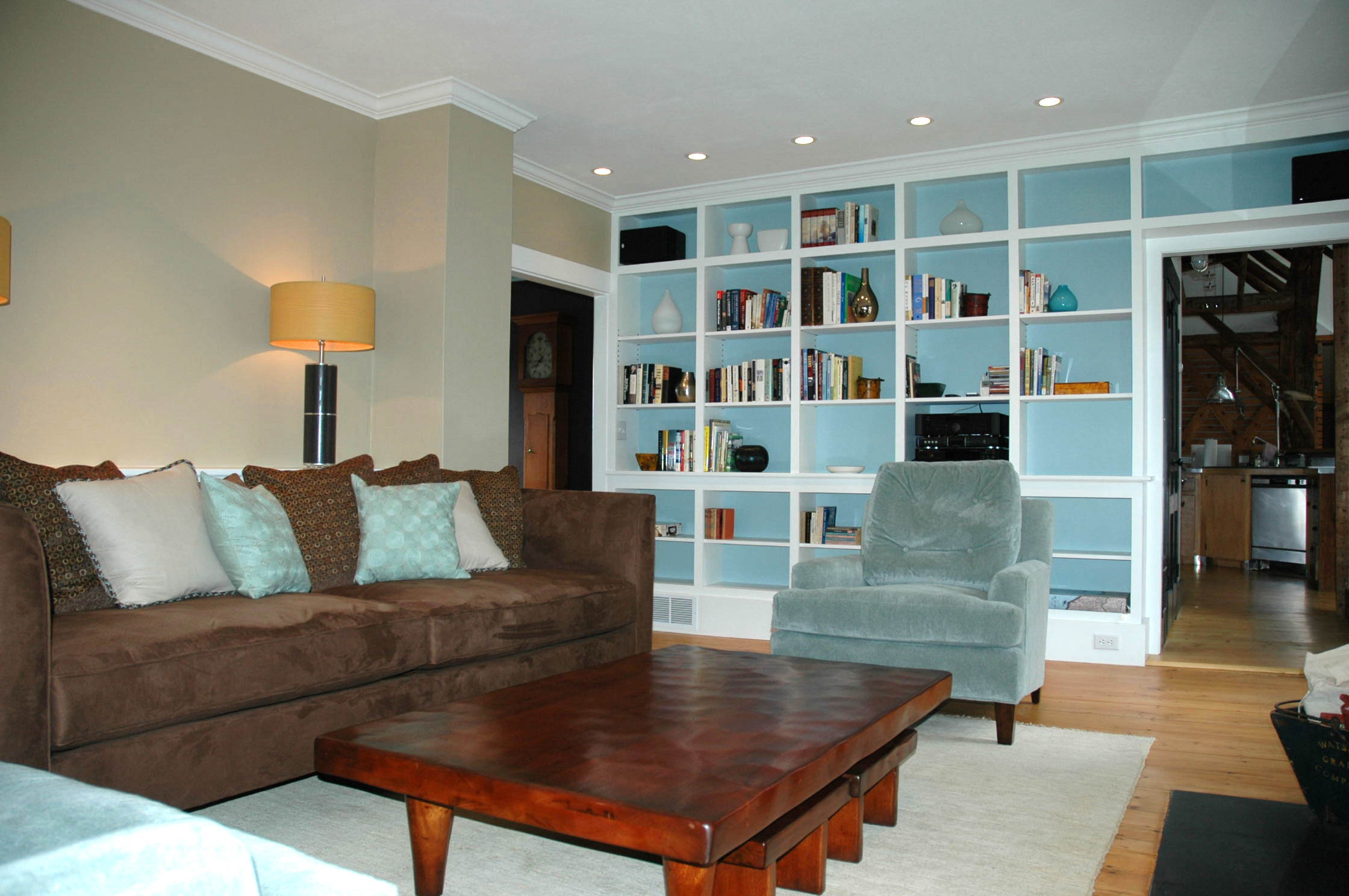 Open shelves hold books and memorabilia.