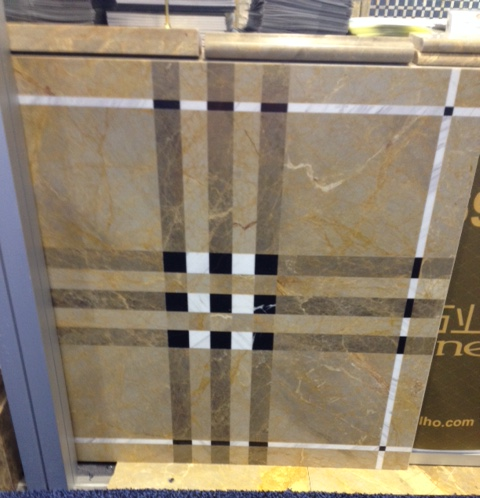 Yes, I am preppy! That is why I love this plaid! It is a mix of different stone tiles that create the plaid.