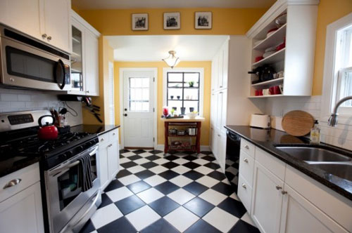 On a budget? Stock black and white ceramic tiles give a lot of bang for the buck!