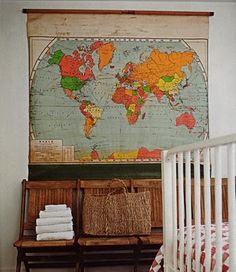 School room maps are great wall art. If they still have their roller, they can also be used to camouflage a wall mounted TV.