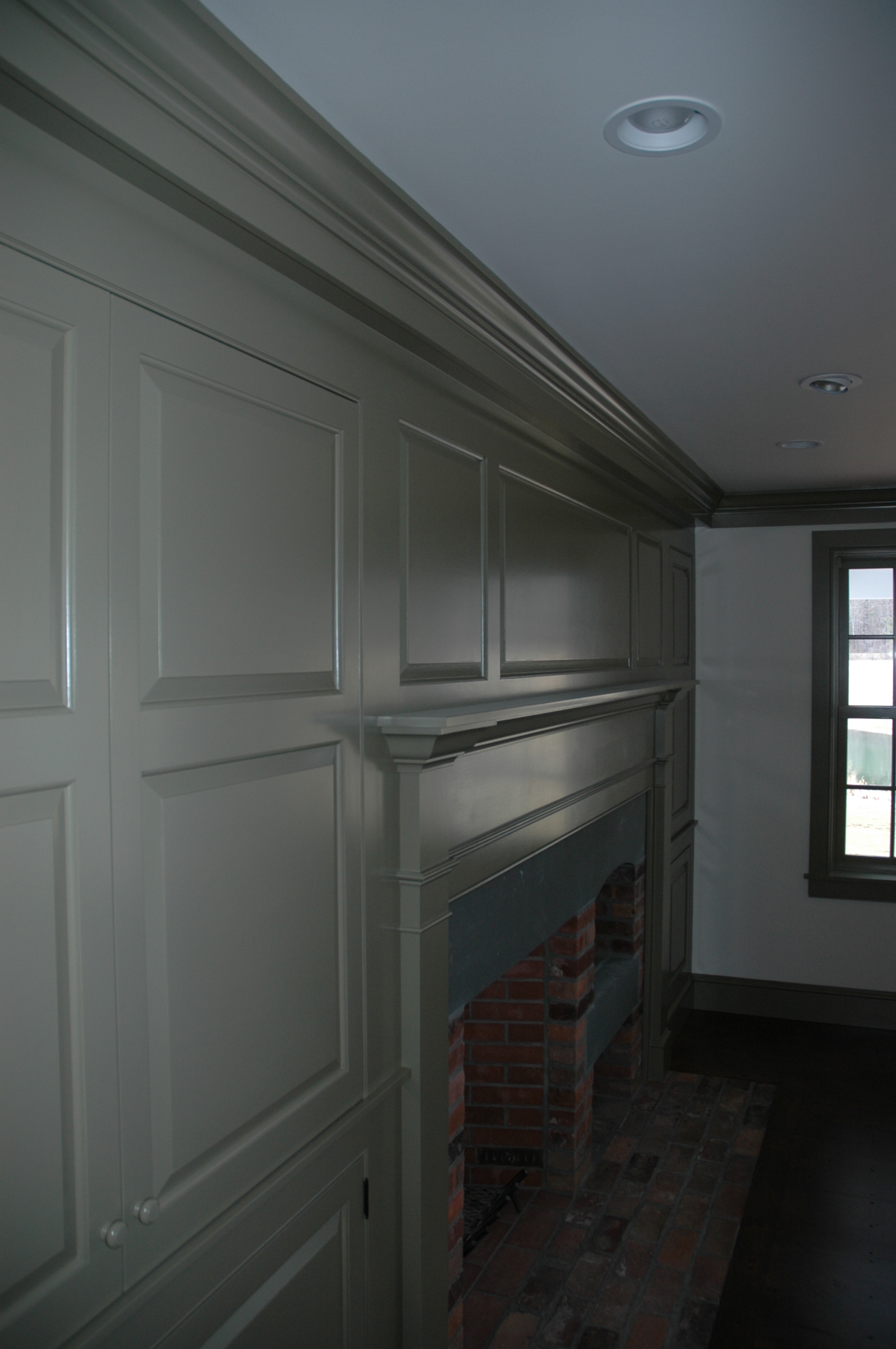 I had the good fortune of choosing the paint colors in this traditional cape, designed by Ramsay Gourd Architects. I chose one of the Historic Colors from Ben Moore . This is Hancock Gray and reads as an olive green.