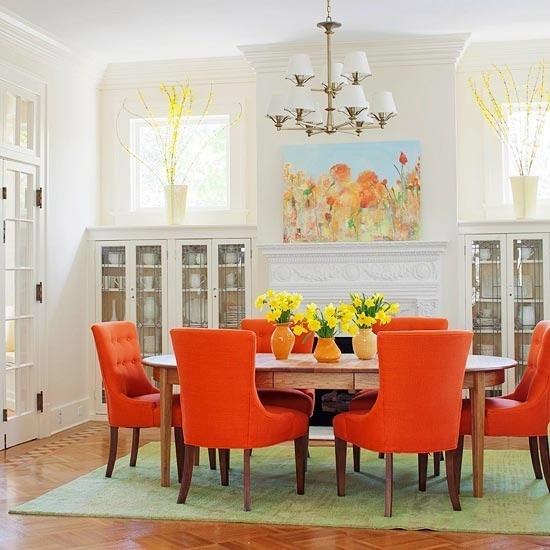 These tufted hostess chairs really pop in this mostly white dining room. 
