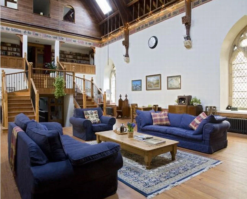 Interesting, they have a pew on the wall next to the staircase. 