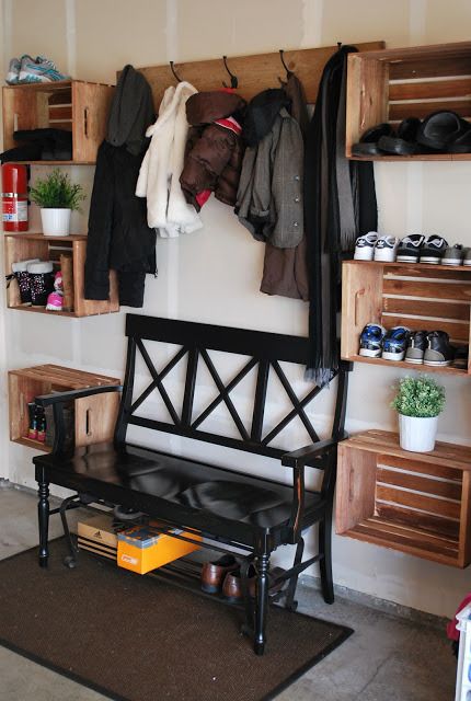 A work-in-progress but a great example of how just one wall can make all the organizational difference. Thrown down a fun, durable rug and a colorful pillow to make the space pop!