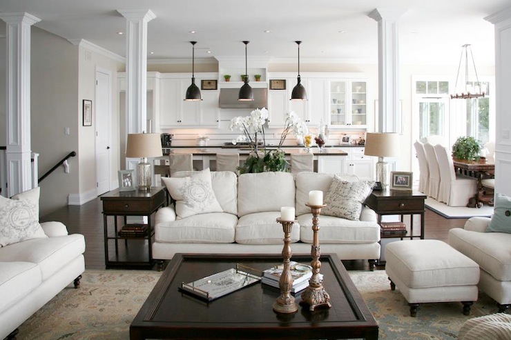 Here's a neutral zone I could spend my day in! Cooking, eating, lounging, this multipurpose space is both comfortable and stylish.