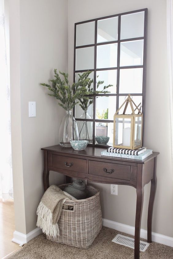 Here the corner of an entryway is brightened by a re-purposed 