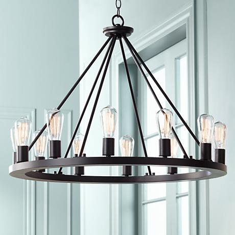 This chandelier is using halogen Edison style bulbs.