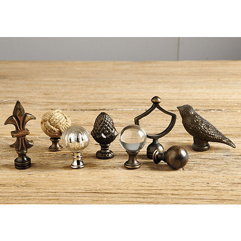 These are a few typical finials that are commonly used, also from Ballard Design. 